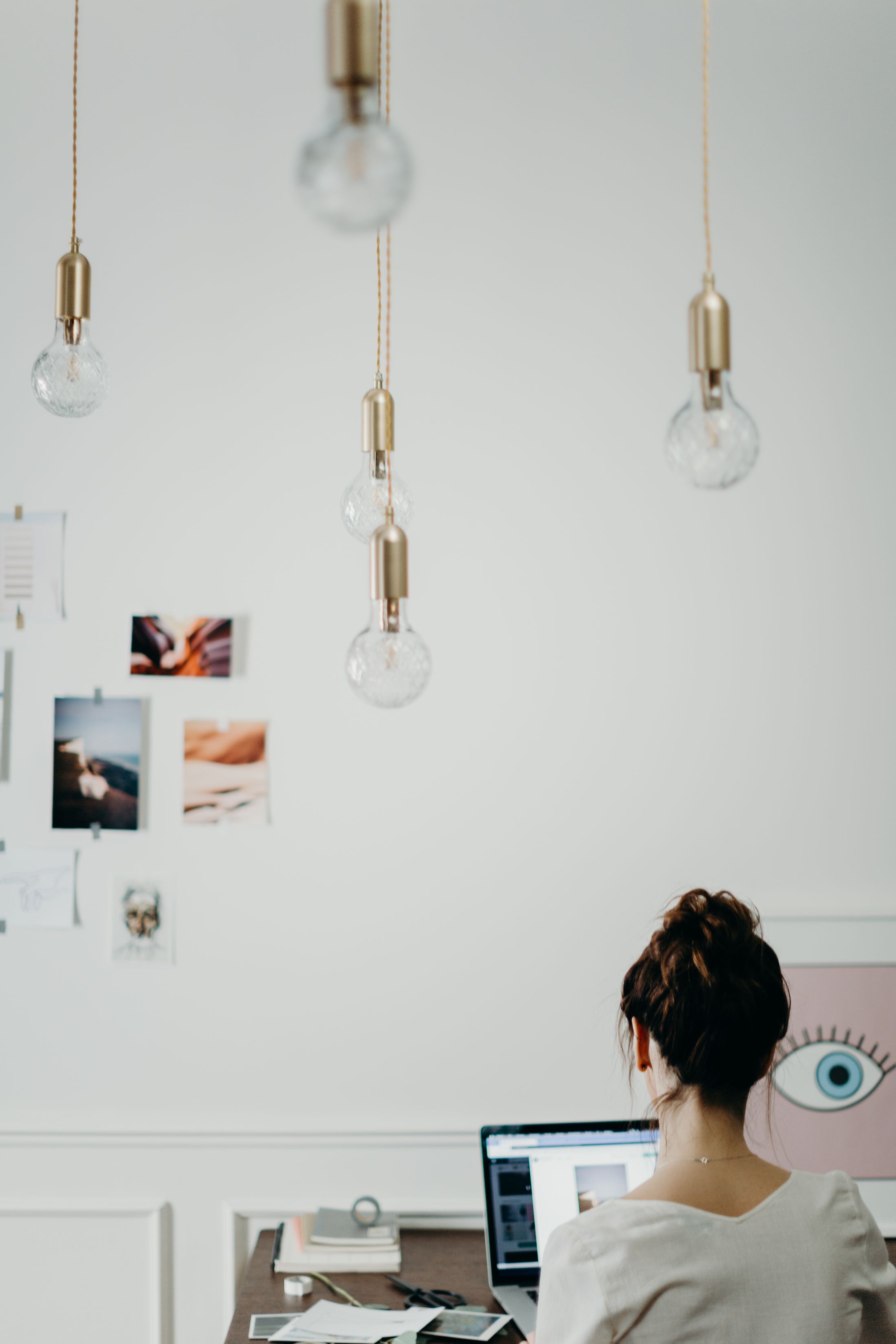 A creator working in a studio with a mood board